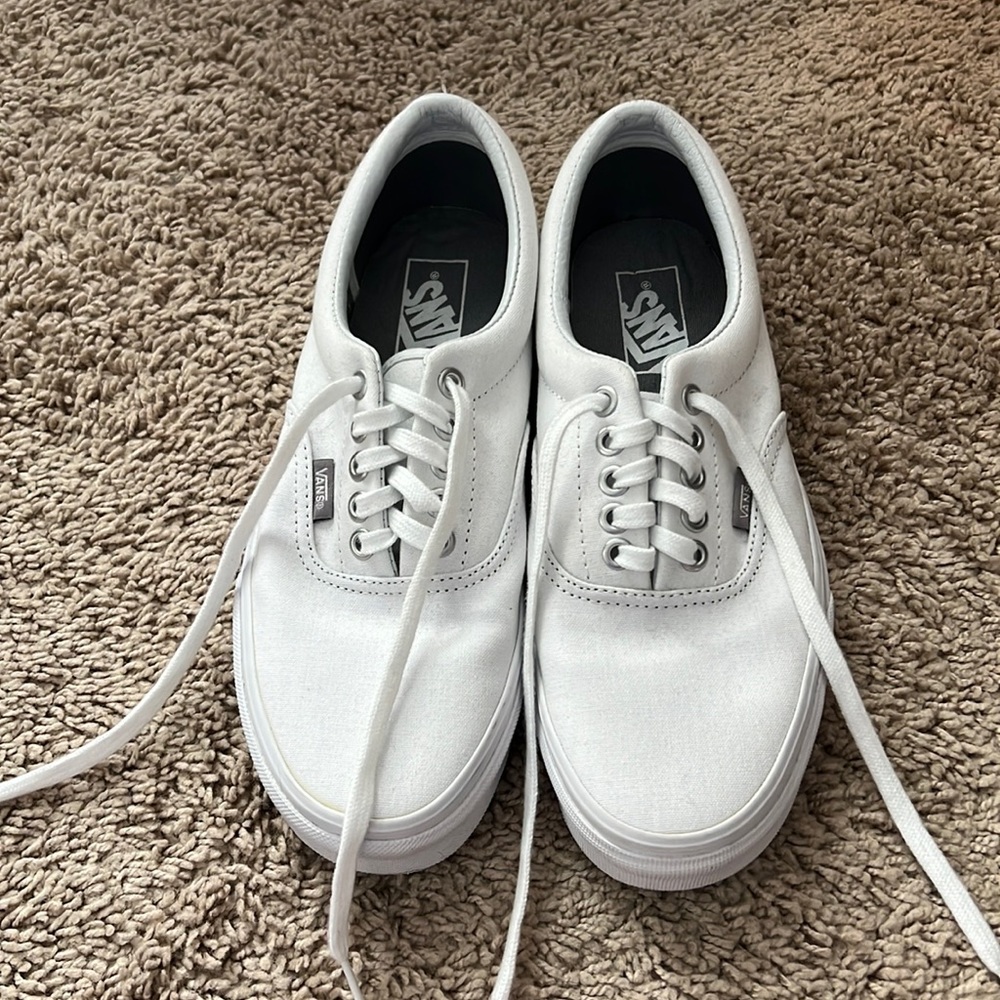 White Vans, Women size 8.5 or Men size 7. Never worn, brand new shoes